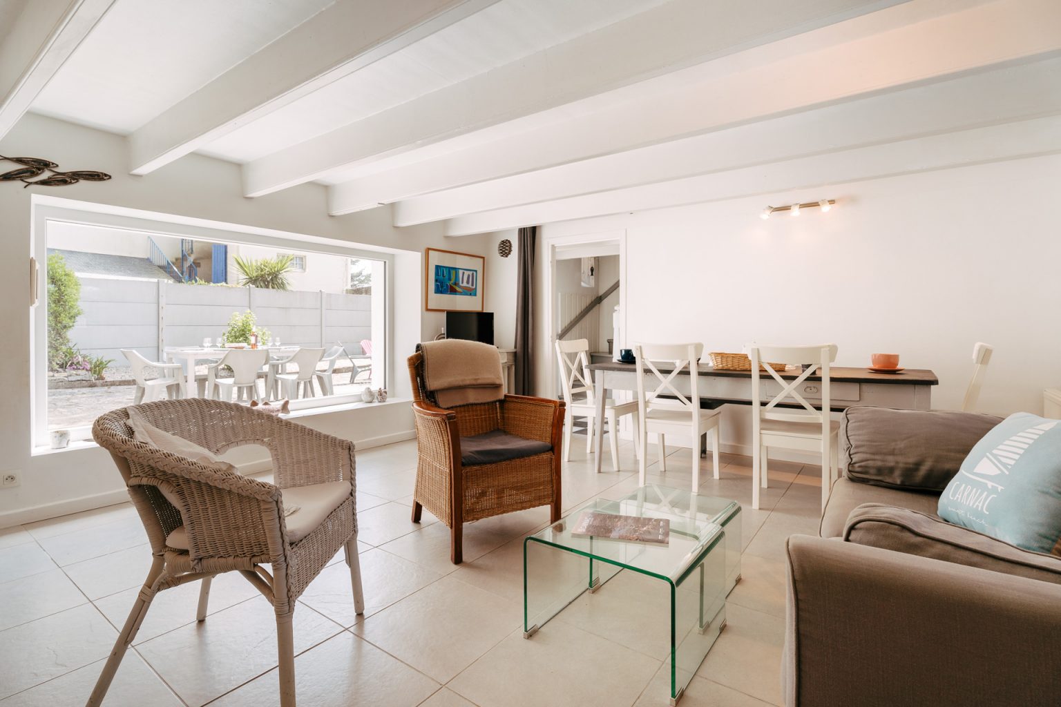 Photographie du salon d'une maison de location à Carnac